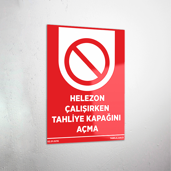 Helezon Çalışırken Tahliye Kapağını Açma Levhası